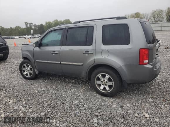 2009 Honda Pilot Touring with VIN 5FNYF38879B002632, listed as a Copart auction lot 82134795 with Not provided miles and Salvage title. Bid and sale history available at DreamBid. Image 2.