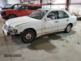 1999 Mercedes-Benz C 230/260/280/320 z VIN WDBHA24G5XA716110, wystawiony jako Copart lot #51326555 z przebiegiem 107 190 mil mil oraz Szkoda całkowita • Salvage title. Historia ofert i sprzedaży dostępna na DreamBid. Obrazek 1.