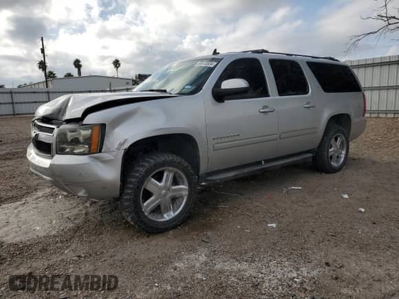 2011 Chevrolet Suburban LT с VIN 1GNSCJE02BR339623, выставлен на аукционе Copart как лот 59632745 с пробегом 220 125 миль миль и Списание • Salvage title. История ставок и продаж доступна на DreamBid. Изображение 1.