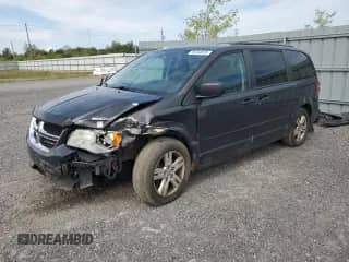 2012 Dodge Grand Caravan American Value z VIN 2C4RDGBG9CR217006, wystawiony jako Copart lot #70744975 z przebiegiem 193 974 mil mil oraz Czysty tytuł • Clean title. Historia ofert i sprzedaży dostępna na DreamBid. Obrazek 1.