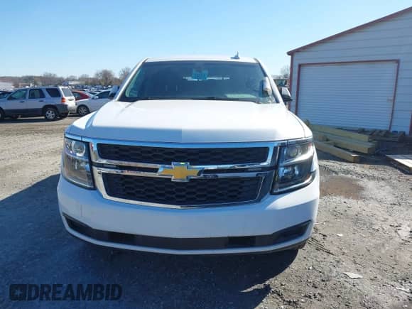 2018 Chevrolet Tahoe Commercial z VIN 1GNSKFECXJR201692, wystawiony jako IAAI lot #41606352 z przebiegiem 36 882 mil mil oraz . Historia ofert i sprzedaży dostępna na DreamBid. Obrazek 12.