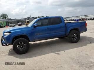 2016 Toyota Tacoma SR5 z VIN 3TMAZ5CN9GM018809, wystawiony jako Copart lot #68243745 z przebiegiem 179 352 mil mil oraz Szkoda całkowita • Salvage title. Historia ofert i sprzedaży dostępna na DreamBid. Obrazek 1.