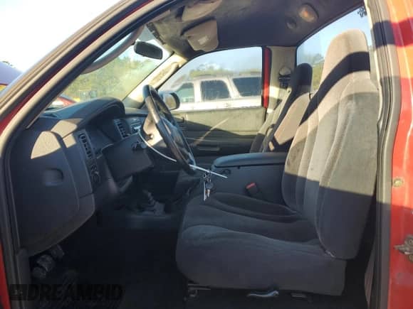 2002 Dodge Dakota z VIN 1B7FL16X42S720579, wystawiony jako Copart lot #88160015 z przebiegiem 164 279 mil mil oraz Szkoda całkowita • Salvage title. Historia ofert i sprzedaży dostępna na DreamBid. Obrazek 7.