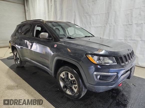 2018 Jeep Compass Trailhawk with VIN 3C4NJDDB8JT264061, listed as a Copart auction lot 68252765 with 69,347 mi miles and Clean title. Bid and sale history available at DreamBid. Image 4.