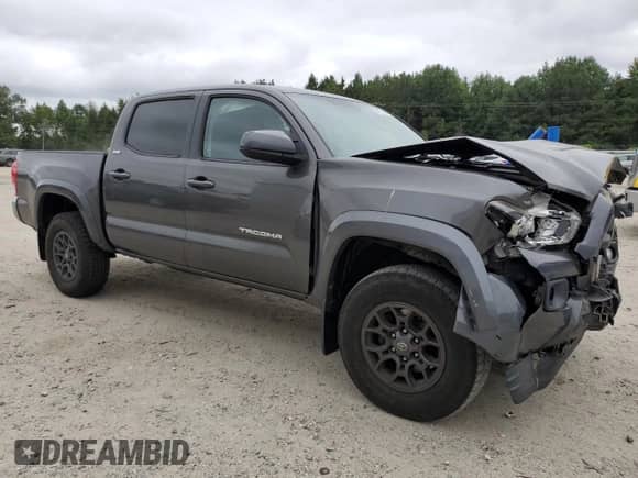2017 Toyota Tacoma SR5 with VIN 3TMCZ5AN4HM120564, listed as a Copart auction lot 80151925 with 105,137 mi miles and Salvage title. Bid and sale history available at DreamBid. Image 4.