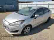 2014 Ford Fiesta SE with VIN 3FADP4BJ7EM228176, listed as a Copart auction lot 70730695 with 139,198 mi miles and Clean title. Bid and sale history available at DreamBid. Image 1.