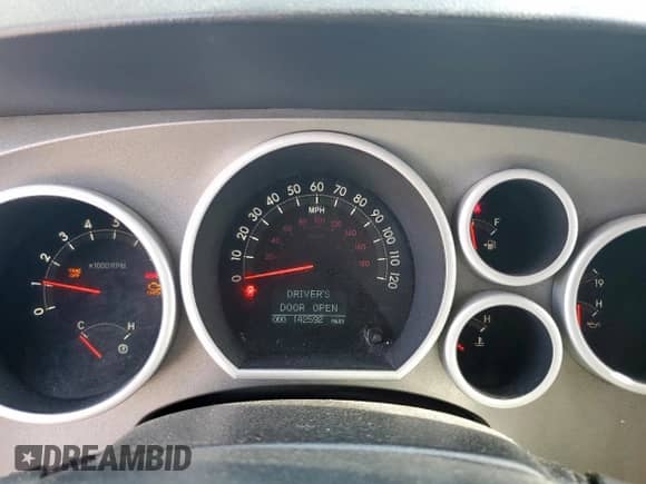 2013 Toyota Tundra Platinum с VIN 5TFFY5F10DX145553, выставлен на аукционе Copart как лот 82311405 с пробегом 142 592 миль миль и Списание • Salvage title. История ставок и продаж доступна на DreamBid. Изображение 9.
