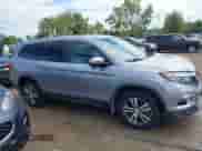 2018 Honda Pilot EX-L with VIN 5FNYF6H76JB035649, listed as a IAAI auction lot 43004811 with 84,008 mi miles and . Bid and sale history available at DreamBid. Image 13.