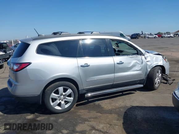 2016 Chevrolet Traverse LT with VIN 1GNKVGKD0GJ215991, listed as a IAAI auction lot 42599249 with 116,262 mi miles and . Bid and sale history available at DreamBid. Image 14.