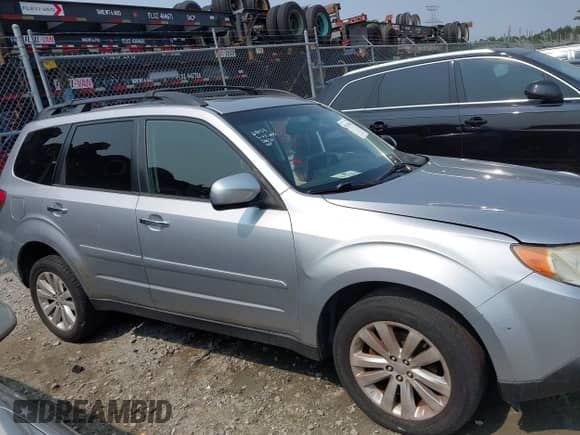 2013 Subaru Forester X Limited with VIN JF2SHAEC2DH441521, listed as a IAAI auction lot 42397403 with 130,000 mi miles and . Bid and sale history available at DreamBid. Image 13.