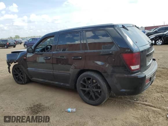 2007 Jeep Grand Cherokee SRT-8 с VIN 1J8HR78357C576121, выставлен на аукционе Copart как лот 67954605 с пробегом Не указан миль и Списание • Salvage title. История ставок и продаж доступна на DreamBid. Изображение 2.