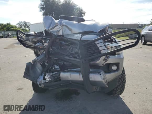 2020 Toyota Tacoma SR5 с VIN 3TMBZ5DN0LM024172, выставлен на аукционе Copart как лот 73004284 с пробегом 106 156 миль миль и На запчасти • Non repairable. История ставок и продаж доступна на DreamBid. Изображение 5.