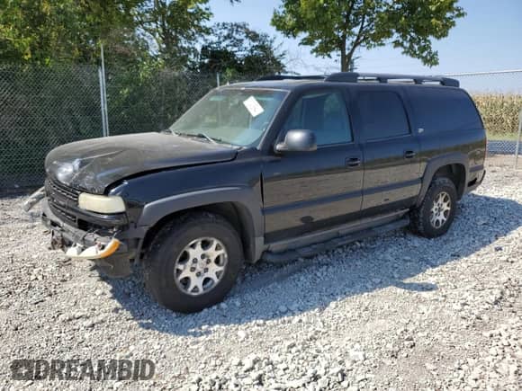 2003 Chevrolet Suburban Z71 z VIN 3GNFK16Z93G264731, wystawiony jako Copart lot #71243894 z przebiegiem Nie podano mil oraz Szkoda całkowita • Salvage title. Historia ofert i sprzedaży dostępna na DreamBid. Obrazek 1.