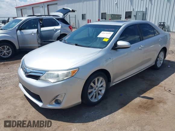 2014 Toyota Camry LE with VIN 4T1BD1FK8EU132401, listed as a IAAI auction lot 42671459 with 214,285 mi miles and . Bid and sale history available at DreamBid. Image 2.