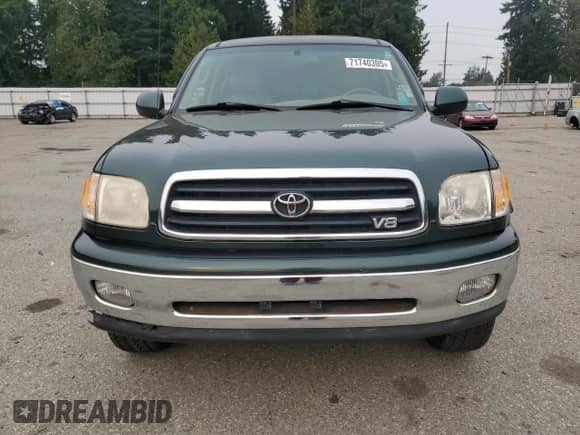 2001 Toyota Tundra Limited z VIN 5TBBT48171S143054, wystawiony jako Copart lot #71740305 z przebiegiem 121 330 mil mil oraz Czysty tytuł • Clean title. Historia ofert i sprzedaży dostępna na DreamBid. Obrazek 5.