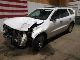 2013 Dodge Durango Crew with VIN 1C4RDJDG9DC554196, listed as a Copart auction lot 80313895 with 104,486 mi miles and Salvage title. Bid and sale history available at DreamBid. Image 1.