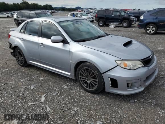 2013 Subaru WRX WRX Premium with VIN JF1GV7F66DG015187, listed as a Copart auction lot 84384865 with 126,624 mi miles and Salvage title. Bid and sale history available at DreamBid. Image 4.