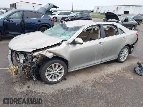 2013 Toyota Camry LE with VIN 4T1BD1FK3DU083610, listed as a IAAI auction lot 42601184 with 94,250 mi miles and . Bid and sale history available at DreamBid. Image 2.