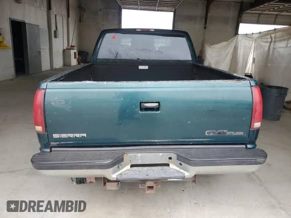 1995 GMC Sierra 1500 z VIN 2GTEC19K2S1558740, wystawiony jako Copart lot #69398185 z przebiegiem 386 899 mil mil oraz Szkoda całkowita • Salvage title. Historia ofert i sprzedaży dostępna na DreamBid. Obrazek 6.