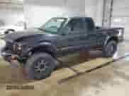 1998 Chevrolet S-10 LS with VIN 1GCCT19W7W8116291, listed as a Copart auction lot 68867615 with 129,205 mi miles and Salvage title. Bid and sale history available at DreamBid. Image 1.