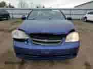 2005 Chevrolet Optra LS с VIN KL1JK59Z85K144184, выставлен на аукционе Copart как лот 48537625 с пробегом 346 711 миль миль и Списание • Salvage title. История ставок и продаж доступна на DreamBid. Изображение 5.