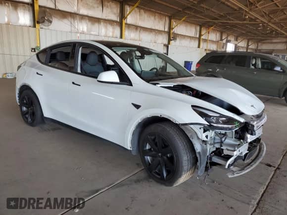 2023 Tesla Model Y Long Range with VIN 7SAYGAEE4PF833503, listed as a Copart auction lot 62376755 with 16,920 mi miles and Salvage title. Bid and sale history available at DreamBid. Image 4.