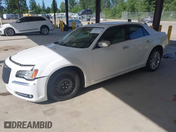 2013 Chrysler 300 C with VIN 2C3CCAET4DH504862, listed as a IAAI auction lot 42403456 with 77,468 mi miles and . Bid and sale history available at DreamBid. Image 2.