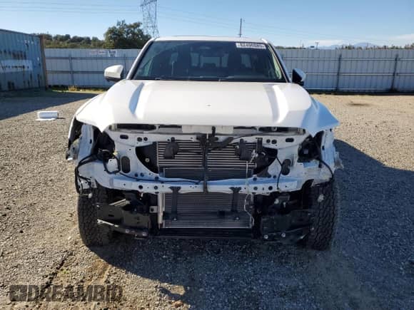 2024 Toyota Tacoma TRD Off Road with VIN 3TMLB5JN8RM013149, listed as a Copart auction lot 82496085 with 21,215 mi miles and Salvage title. Bid and sale history available at DreamBid. Image 5.