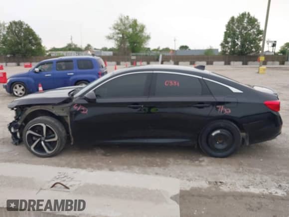 2019 Honda Accord Sport z VIN 1HGCV2F32KA004612, wystawiony jako IAAI lot #42400331 z przebiegiem 33 942 mil mil oraz . Historia ofert i sprzedaży dostępna na DreamBid. Obrazek 14.