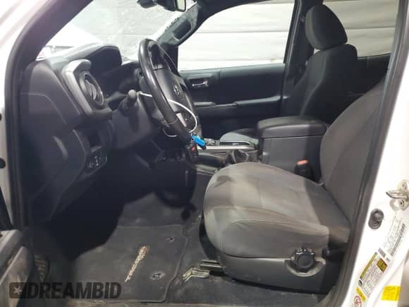 2019 Toyota Tacoma TRD Off Road with VIN 3TMCZ5AN8KM217225, listed as a Copart auction lot 71895695 with 80,104 mi miles and Salvage title. Bid and sale history available at DreamBid. Image 7.