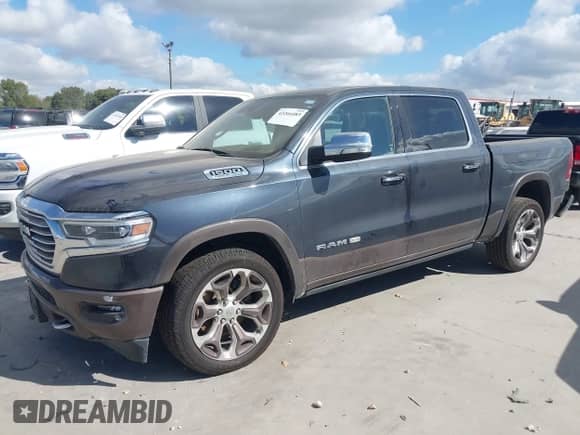 2021 Ram 1500 Longhorn z VIN 1C6SRFKT1MN586992, wystawiony jako IAAI lot #43266483 z przebiegiem 101 816 mil mil oraz . Historia ofert i sprzedaży dostępna na DreamBid. Obrazek 22.