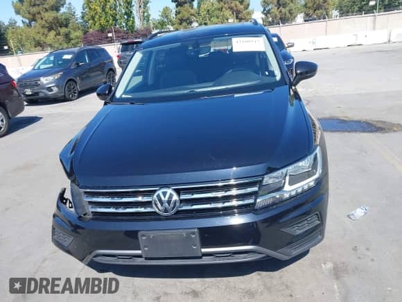 2021 Volkswagen Tiguan SE with VIN 3VV3B7AX4MM127236, listed as a IAAI auction lot 43100517 with 48,229 mi miles and . Bid and sale history available at DreamBid. Image 12.