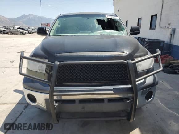 2007 Toyota Tundra SR5 z VIN 5TBET541X7S454852, wystawiony jako Copart lot #61135375 z przebiegiem Nie podano mil oraz Szkoda całkowita • Salvage title. Historia ofert i sprzedaży dostępna na DreamBid. Obrazek 5.