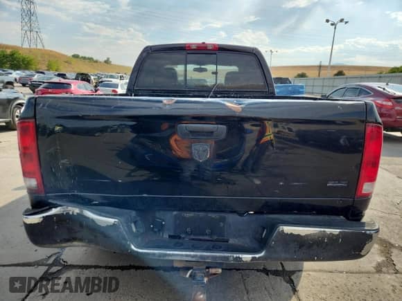 2005 Dodge 1500 SLT with VIN 1D7HA18D05S279772, listed as a Copart auction lot 71243615 with 217,186 mi miles and Salvage title. Bid and sale history available at DreamBid. Image 6.