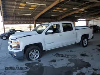2018 Chevrolet Silverado 1500 LT с VIN 3GCUKRECXJG486719, выставлен на аукционе Copart как лот 69023615 с пробегом 105 611 миль миль и Списание • Salvage title. История ставок и продаж доступна на DreamBid. Изображение 1.