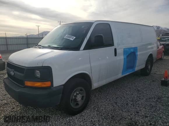 2015 Chevrolet Express Cargo with VIN 1GCWGGCF3F1165087, listed as a Copart auction lot 85606914 with 208,828 mi miles and Salvage title. Bid and sale history available at DreamBid. Image 1.