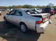 2001 Toyota Camry LE z VIN JT2BG22KX10598722, wystawiony jako Copart lot #84900455 z przebiegiem 153 570 mil mil oraz Szkoda całkowita • Salvage title. Historia ofert i sprzedaży dostępna na DreamBid. Obrazek 2.