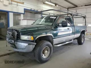 1998 Dodge 2500 with VIN 1B7KF23D9WJ116981, listed as a Copart auction lot 68971164 with 221,823 mi miles and Salvage title. Bid and sale history available at DreamBid. Image 1.