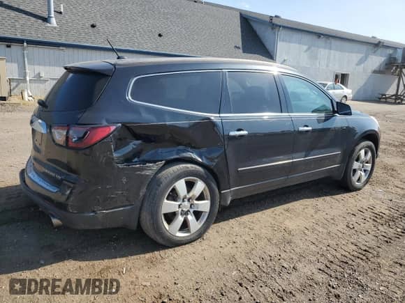 2013 Chevrolet Traverse LTZ с VIN 1GNKVLKDXDJ216084, выставлен на аукционе Copart как лот 67052615 с пробегом 155 416 миль миль и Списание • Salvage title. История ставок и продаж доступна на DreamBid. Изображение 3.