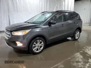 2018 Ford Escape SE с VIN 1FMCU9GD5JUD06082, выставлен на аукционе Copart как лот 84434525 с пробегом 152 456 миль миль и Чистый • Clean title. История ставок и продаж доступна на DreamBid. Изображение 1.