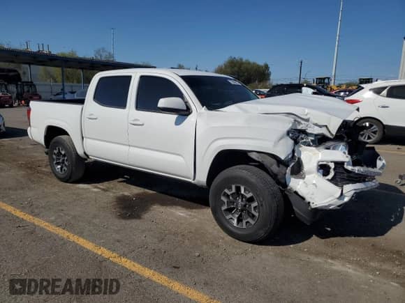 2022 Toyota Tacoma SR с VIN 3TMCZ5AN0NM485982, выставлен на аукционе Copart как лот 70948235 с пробегом 25 754 миль миль и Списание • Salvage title. История ставок и продаж доступна на DreamBid. Изображение 4.