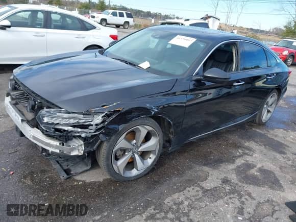 2018 Honda Accord Touring z VIN 1HGCV2F94JA007417, wystawiony jako IAAI lot #41378957 z przebiegiem 111 890 mil mil oraz . Historia ofert i sprzedaży dostępna na DreamBid. Obrazek 2.