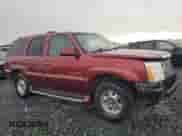 2002 Cadillac Escalade с VIN 1GYEK63N82R219839, выставлен на аукционе Copart как лот 82534735 с пробегом 224 564 миль миль и Списание • Salvage title. История ставок и продаж доступна на DreamBid. Изображение 4.