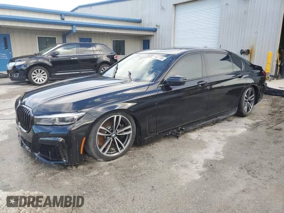 2022 BMW 7 Series 750i xDrive с VIN WBA7U2C01NCK83702, выставлен на аукционе Copart как лот 74327704 с пробегом Не указан миль и Списание • Salvage title. История ставок и продаж доступна на DreamBid. Изображение 1.