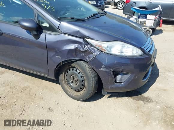 2012 Ford Fiesta SE with VIN 3FADP4BJ8CM123319, listed as a IAAI auction lot 43147857 with 122,046 mi miles and . Bid and sale history available at DreamBid. Image 6.