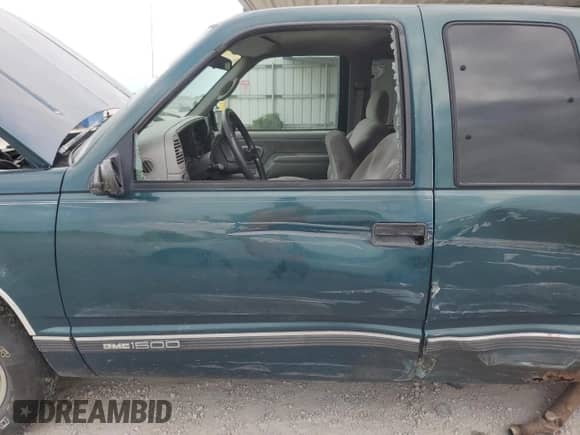 1995 GMC Sierra 1500 z VIN 2GTEC19K9S1565099, wystawiony jako Copart lot #66949044 z przebiegiem 25 147 mil mil oraz Nie do naprawy • Non repairable. Historia ofert i sprzedaży dostępna na DreamBid. Obrazek 7.