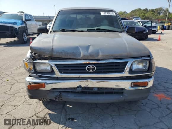 1995 Toyota Tacoma z VIN 4TAUN53B3SZ020458, wystawiony jako Copart lot #71509355 z przebiegiem 146 447 mil mil oraz Czysty tytuł • Clean title. Historia ofert i sprzedaży dostępna na DreamBid. Obrazek 5.