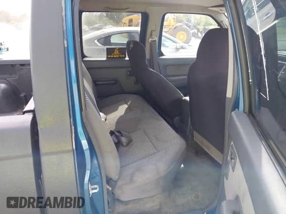 2003 Nissan Frontier XE with VIN 1N6ED29X93C409300, listed as a IAAI auction lot 43339329 with 288,807 mi miles and . Bid and sale history available at DreamBid. Image 8.