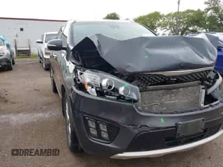 2016 Kia Sorento SXL z VIN 5XYPKDA56GG097851, wystawiony jako IAAI lot #42926098 z przebiegiem 114 286 mil mil oraz . Historia ofert i sprzedaży dostępna na DreamBid. Obrazek 1.