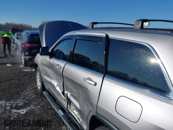 2017 Jeep Grand Cherokee Laredo with VIN 1C4RJEAG3HC890386, listed as a IAAI auction lot 41790836 with 67,166 mi miles and . Bid and sale history available at DreamBid. Image 6.